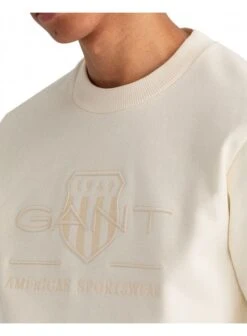 Gant Regular Tonal Shield Crew Neck Sweatshirt Eggshell Eggshell -Lyle Clothing Shop gant regular tonal shield crew neck sweatshirt eggshell p11286 13693 medium